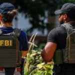 FBI fires agents seen kneeling at George Floyd protest 1