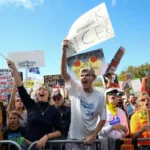 Thousands rally in no kings protests against Trump 1