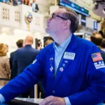 stocks close at record highs as investors shake off shutdown concerns 1
