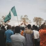 Nigerian citizens gather for official Nigeria repatriation update processing.